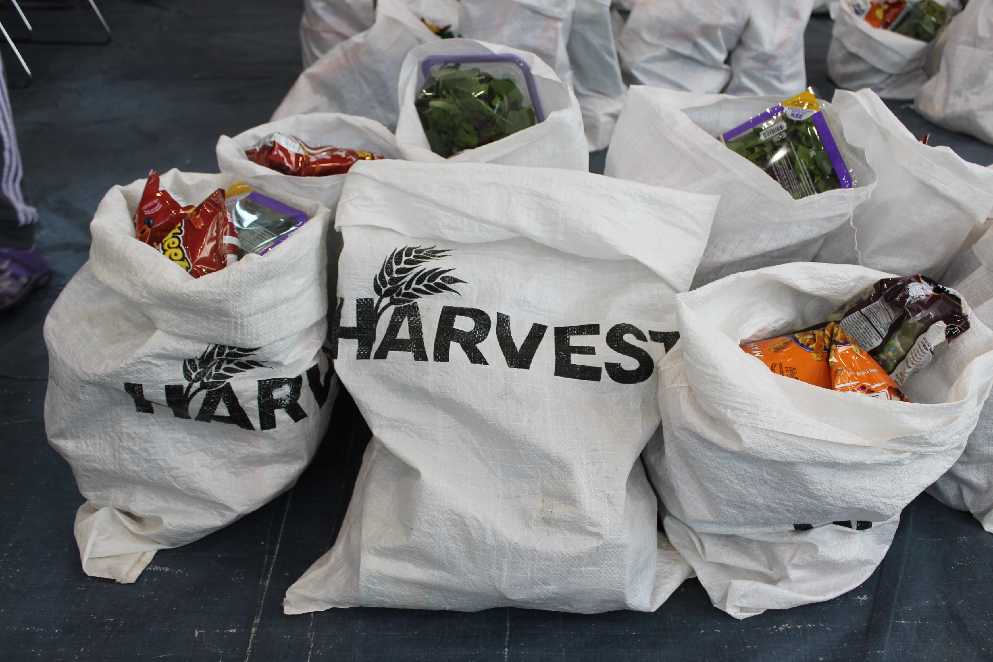 Volunteers serving at the food bank